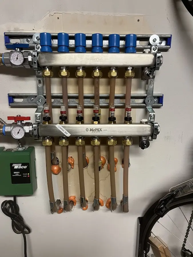 Plumber performing Gas Line Installation at a residential property in Woburn